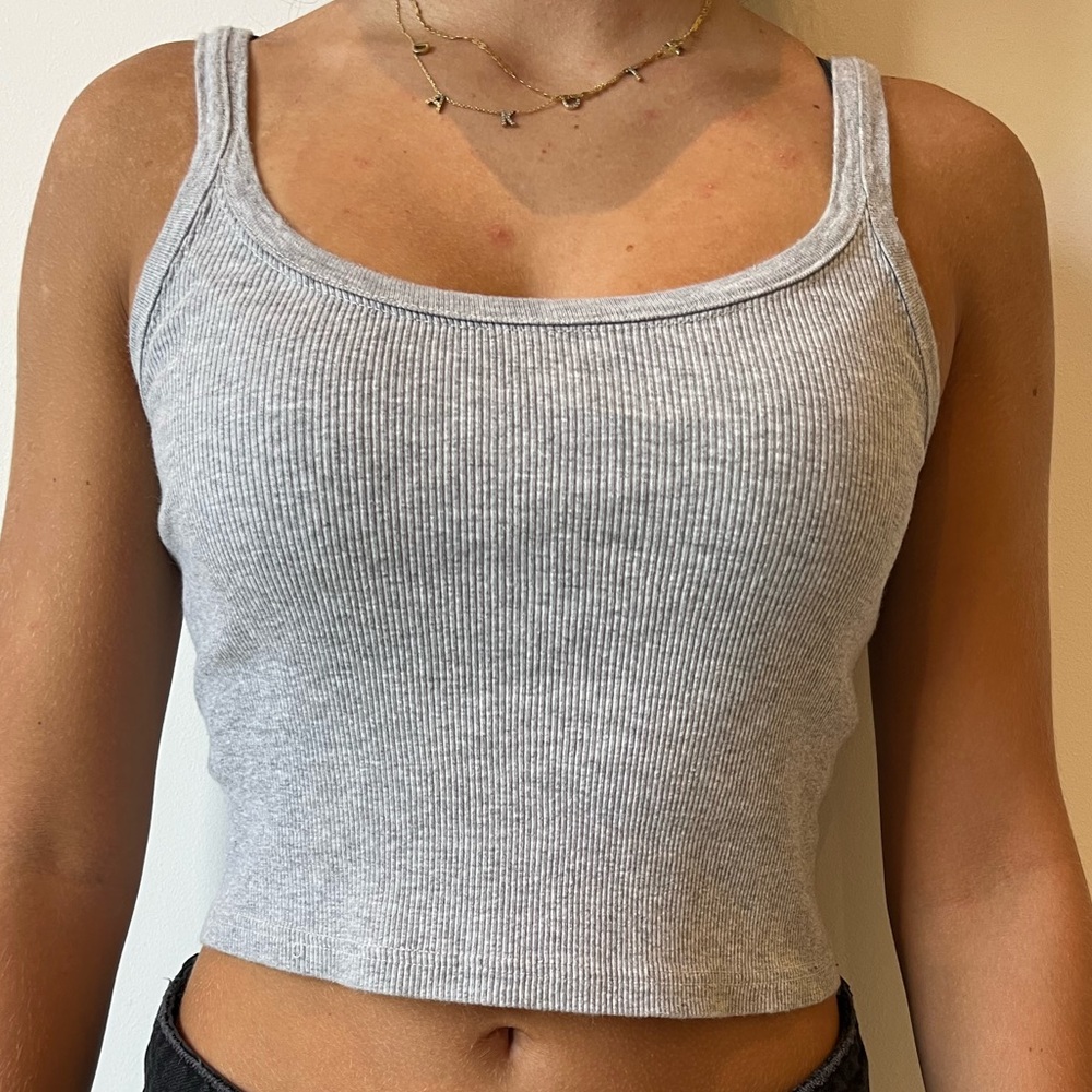 In perfect condition. Simple gray tank top.